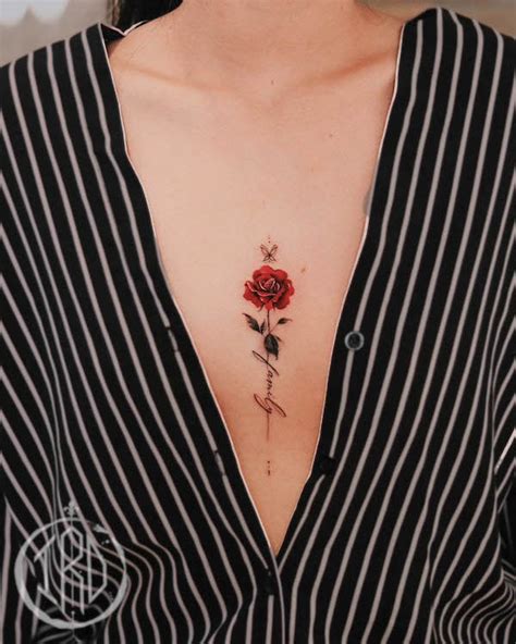 Rose tattoo between breast